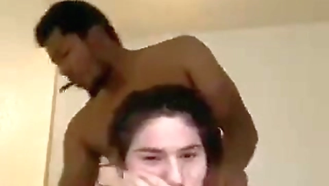Amateur brunette teen fucks in a interracial cam vid