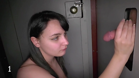 Brunette brunette milf giving a blowjob to two men