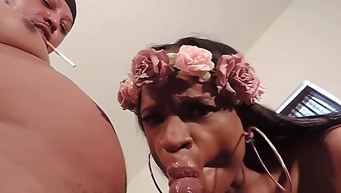 Ebony girl with a tattooed face has a deepthroating experience