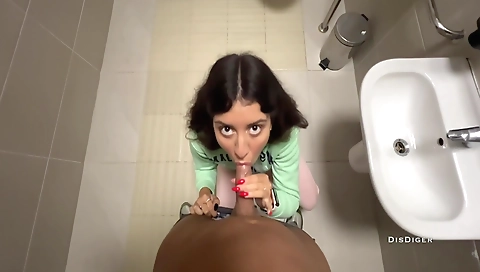 Slutty brunette in the public toilet gets a creampie
