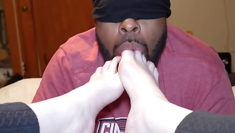 Amateur redhead with a red painted toe swallows a dick